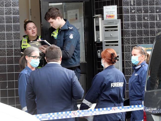 Police at the scene in Footscray where a woman was fatally stabbed, allegedly by a 12-year-old girl. Picture: David Crosling