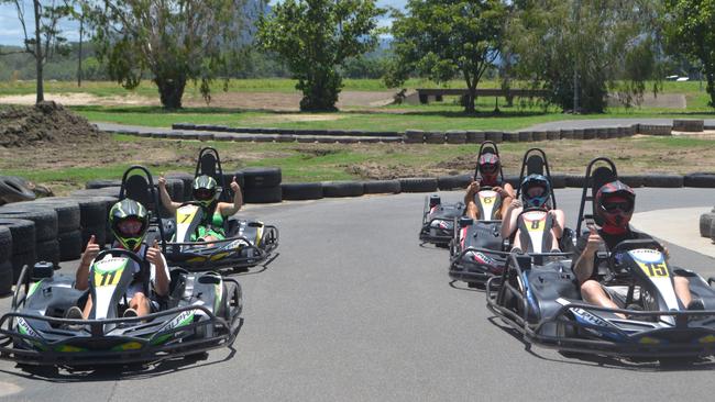 Katharina Belani, Nigel Brown, Matthew Brown, Hayley O'Neill and Alex Rutherford get ready to rumble on the newly reopened Cairns Kart Hire racetrack after an extensive clean up following Cyclone Jasper.