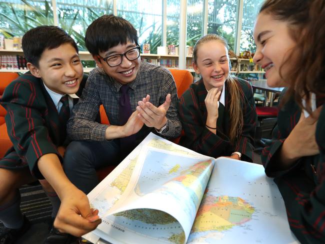 7/9/2017: L-R John Kwon 13 year 8,Hayley Bishop 13 year 8, first year teacher Seong Hun Kim (history and geography 7-10), and Abigail Bold 12 year 7 at St Paul's School in Bald Hills, Brisbane. A new report  looks at who is going into teaching, what marks they are getting, if they are getting in other ways, if they are getting support, and if they are staying in the profession. Lyndon Mechielsen/The Australian