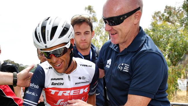 Stuart O’Grady congratulates Richie Porte after his Stage 3 victory. Picture: AAP Image/David Mariuz