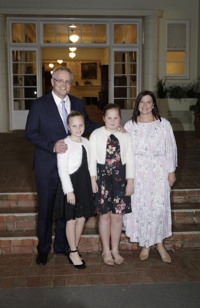 Prime Minister Scott Morrison, with his wife Jenny Morrison and their daughters Abbey and Lily, at Government House after being sworn in by the Governor General Sir Peter Cosgrove tonight. Picture: Sean Davey