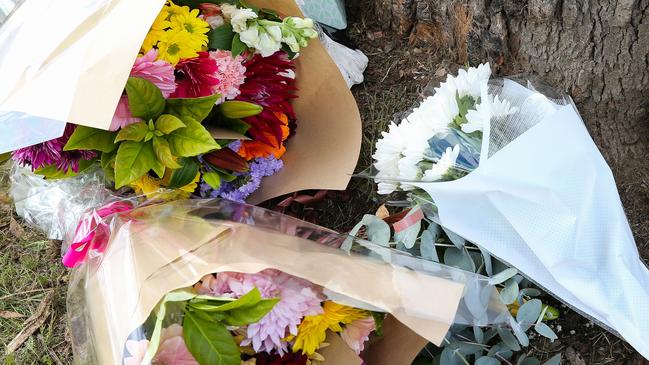 Flowers left at the scene today. Picture: NCA Newswire /Gaye Gerard