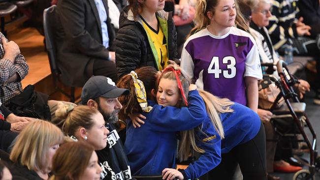 Jordyn Callea, who was injured in the crash that killed her best friend, Sophia, is comforted by a friend at Friday’s service. Photo: Tricia Watkinson.