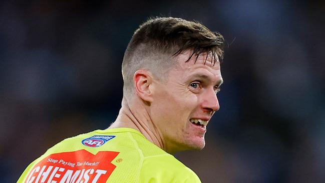 MELBOURNE - APRIL 10: AFL Boundary Umpire, Matthew Tomkins is seen after colliding with Jeremy Cameron of the Cats (not pictured) during the 2023 AFL Round 04 match between the Geelong Cats and the Hawthorn Hawks at the Melbourne Cricket Ground on April 10, 2023 in Melbourne, Australia. (Photo by Dylan Burns/AFL Photos via Getty Images)