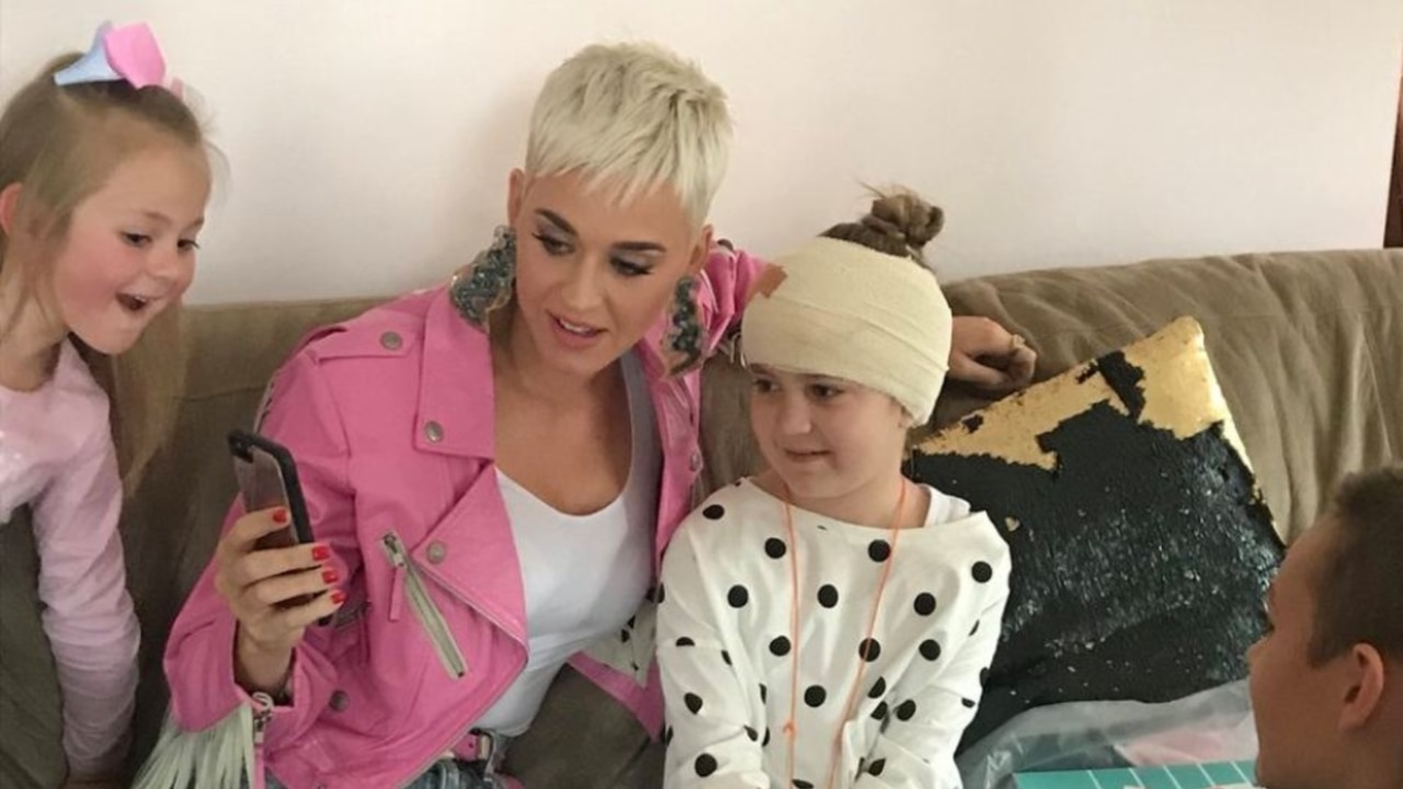 Katy Perry surprises young fan recovering from brain surgery