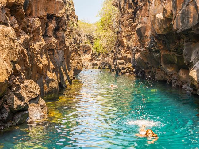 ESCAPE: Galapagos, Susan Bredow -  Puerto Ayora, Galapagos, Ecuador - April 2, 2016: People are swimming in  Las Grietas on Santa Cruz Island in Galapagos. It is popular tourist destination on Santa Cruz Island. . Picture: iStock