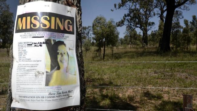 A missing persons poster for Carly McBride who was found by bushwalkers two years after she disappeared.