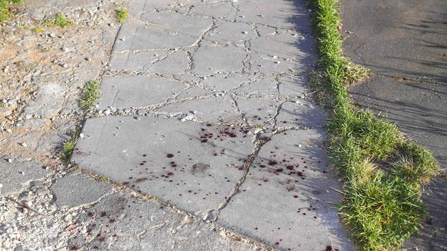 Blood stains at the house where the man was stabbed and later died. Picture: Mark Brake