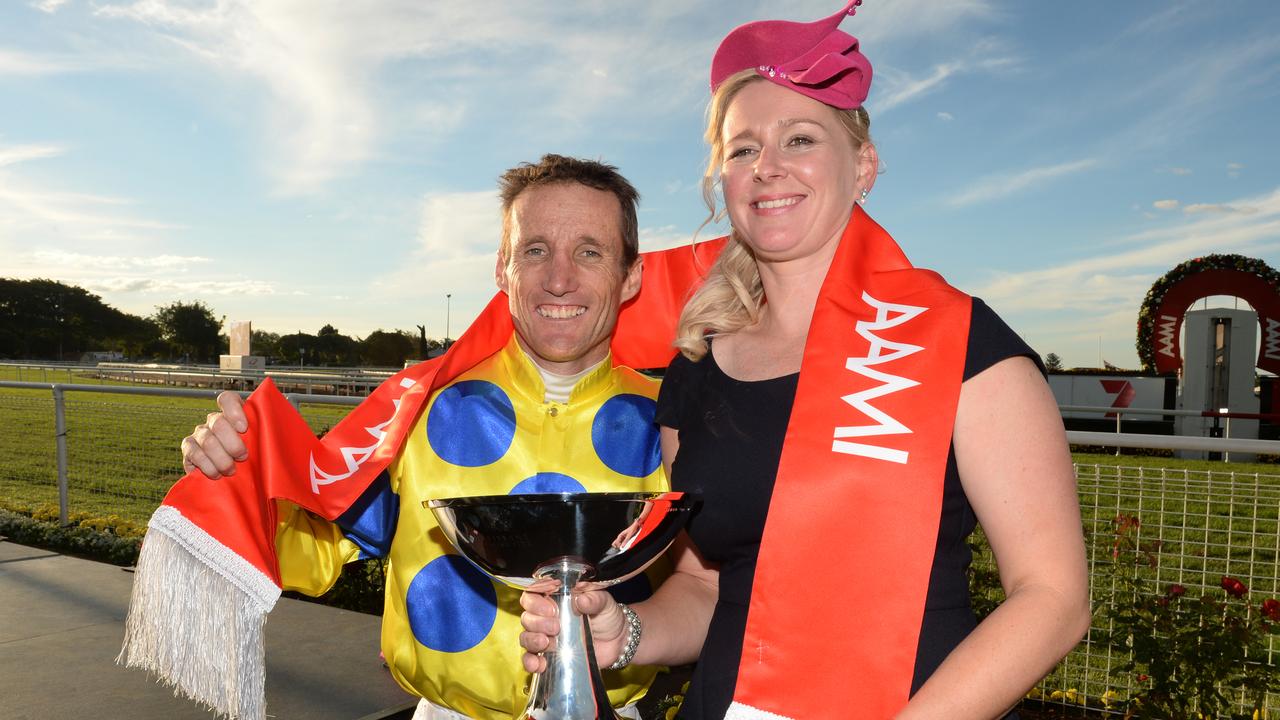 Damien Oliver and Natalie McCall after scoring the Stradbroke Handicap with River Lad in 2014. Picture: AAP.