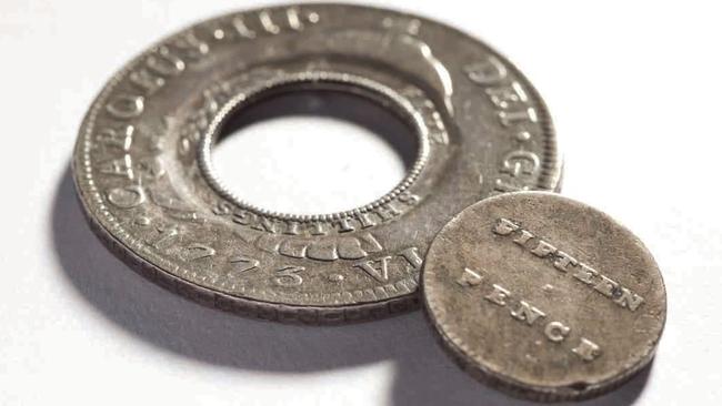 A holey dollar and dump from 1813.