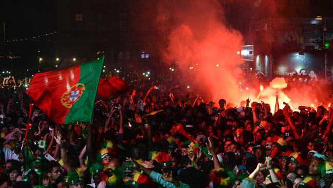 Portugal's national football team supporters celebrate.