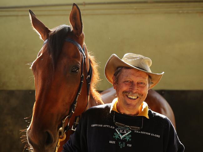 Trainer Ron Leemon with his racehorse Manawanui at his Warwick Farm stables in Sydney. Pic Brett Costello