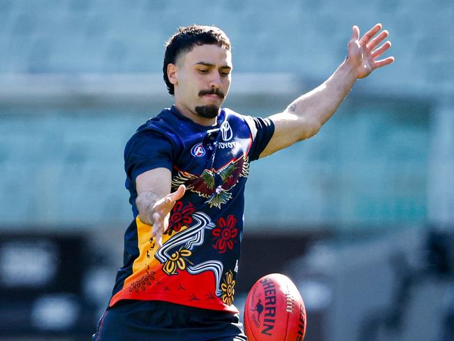 MELBOURNE, AUSTRALIA - MAY 18: Izak Rankine of the Crows warms up before the 2024 AFL Round 10 match between The Collingwood Magpies and Kuwarna (Adelaide Crows) at The Melbourne Cricket Ground on May 18, 2024 in Melbourne, Australia. (Photo by Dylan Burns/AFL Photos via Getty Images)