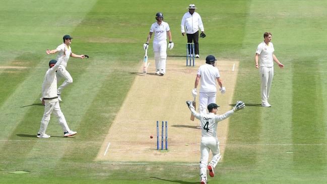 Jonny Bairstow of England is run out by Alex Carey of Australia during day five.