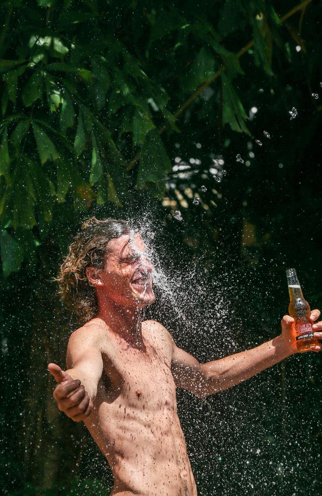 Chris Horsman of Fannie Bay beating the build up heat. Real estate expert Glenn Grantham says the best way to get acclimatised is to come during the hottest period. Picture: Glenn Campbell