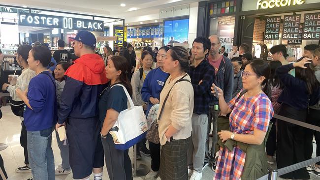 A huge line-up of customers waited for Uniqlo's opening at Garden City on Thursday. Picture: Jonathan O'Neill.