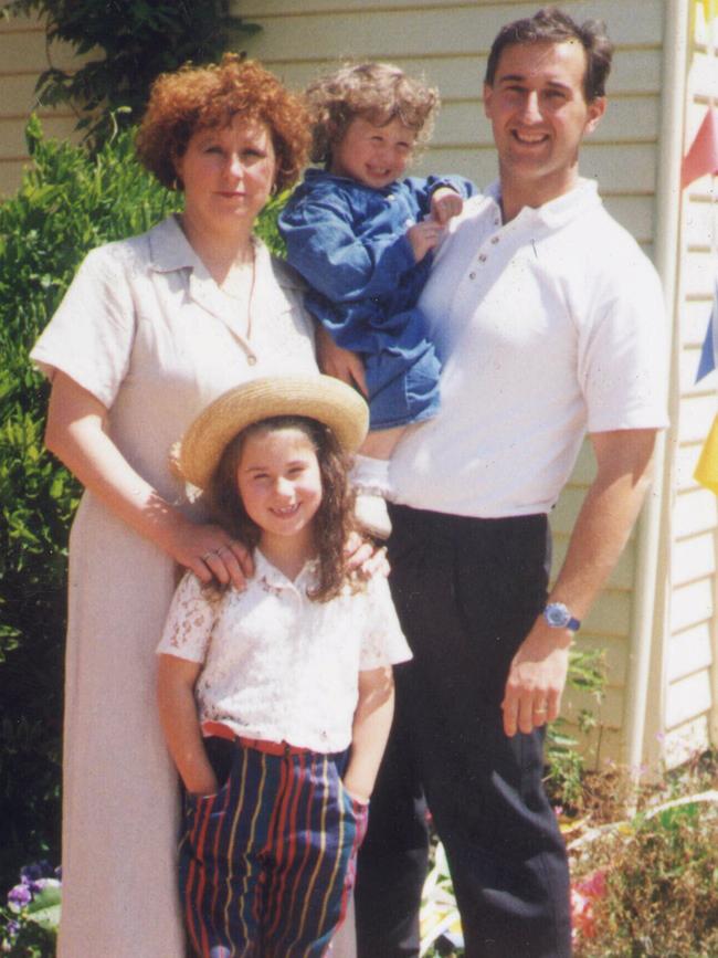 Walter Mikac and family in front of Walter Mikac's Tasman Pharmacy at Nubeena. Picture: Supplied