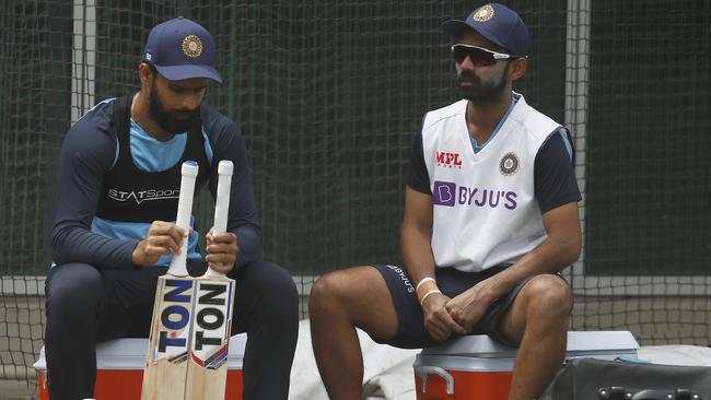 MELBOURNE, AUSTRALIA - DECEMBER 23: Cheteshwar Pujara of India (L) and Ajinkya Rahane of India chat during an Indian Nets Session at the Melbourne Cricket Ground on December 23, 2020 in Melbourne, Australia. (Photo by Daniel Pockett/Getty Images)