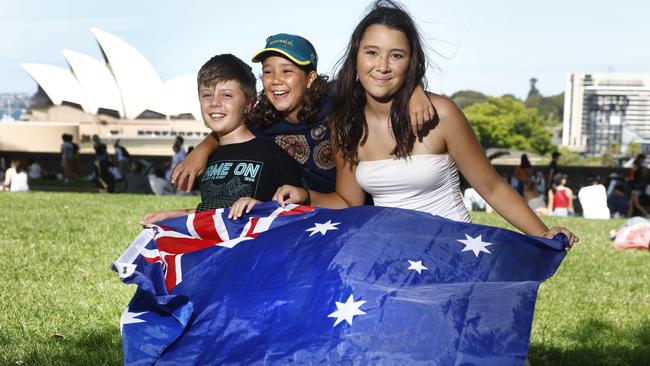 Pictured at The Rocks in Sydney on Australia Day 2025 is Joshua Curtis, Grace Maroney and Piper Maroney. Picture: Richard Dobson