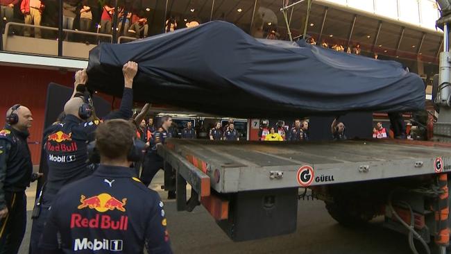 The Red Bull returns to the pits after just four laps in testing.