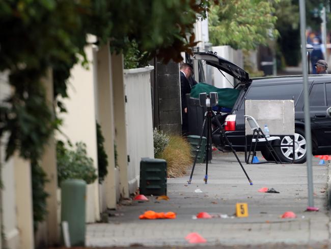 Police remove bodies from the Deans Avenue mosque after the massacre that shocked the world. Picture: Gary Ramage