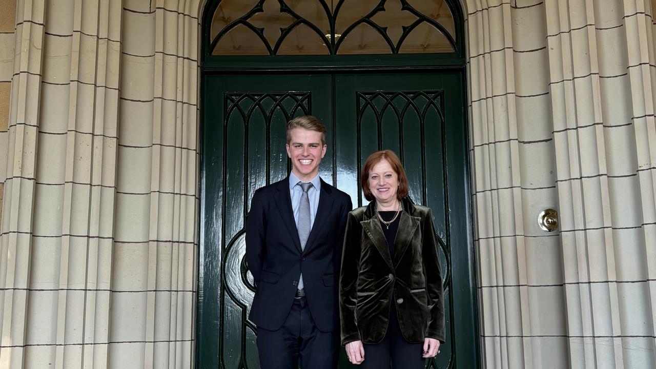 Ulverstone's LGBTQIA+ campaigner Sam Watson has won a Rhodes scholarship where he will pursue postgraduate studies in sustainability, enterprise and the environment, and public policy at the University of Oxford from 2025. Pictured with Tasmanian Governor Barbara Baker Picture: Supplied