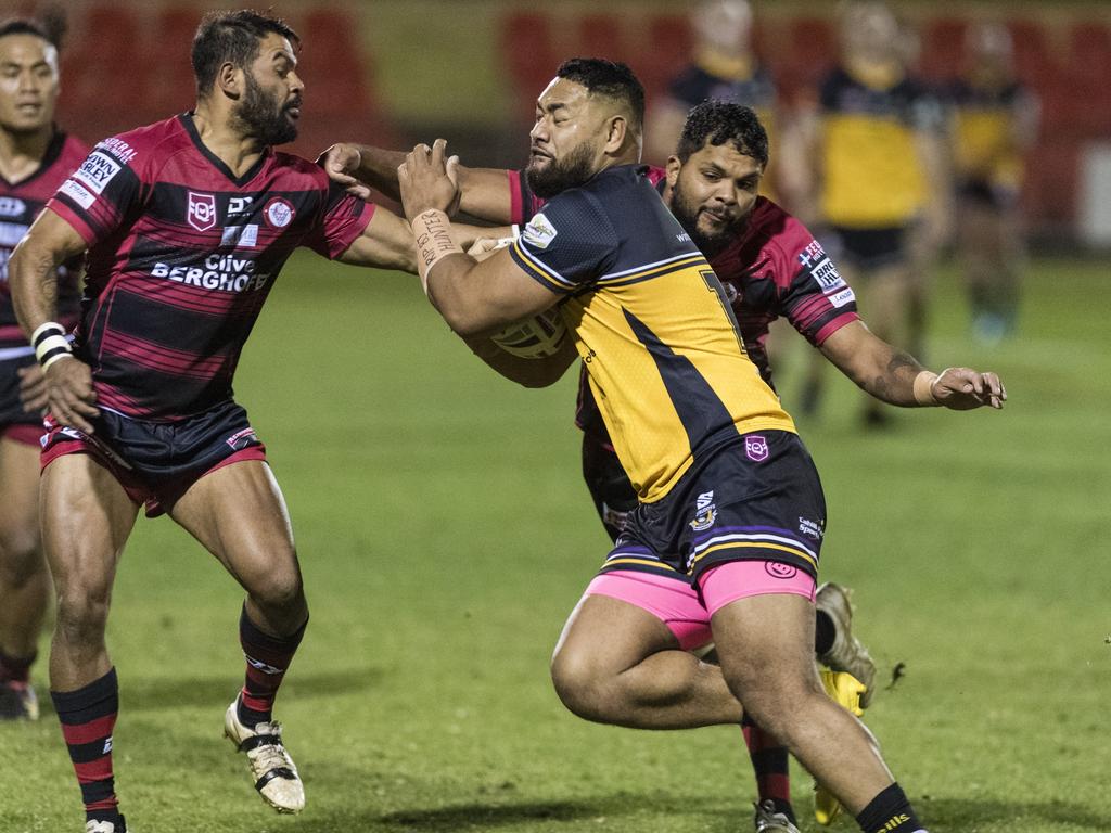 Sione Foueti of Gatton is tackled by Matthew Waites (left) and Dwayne Duncan of Valleys. Picture: Kevin Farmer.