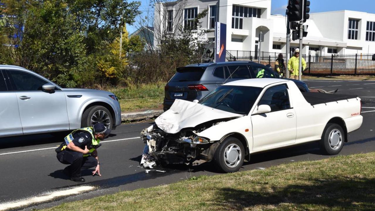 Emergency services have responded to a crash involving a ute and a motorcycle at the intersection of Stephen and West streets in South Toowoomba on July 23, 2024.