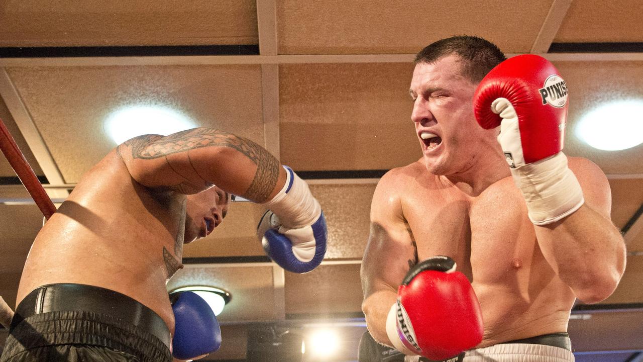 Paul Gallen (right) and Hermann Ene-Purcell fight it out in Toowoomba. Friday, Jan 29, 2016.