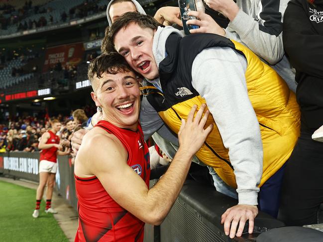 Massimo D’Ambrosio celebrated the win with mates after his AFL debut. Picture: Getty Images