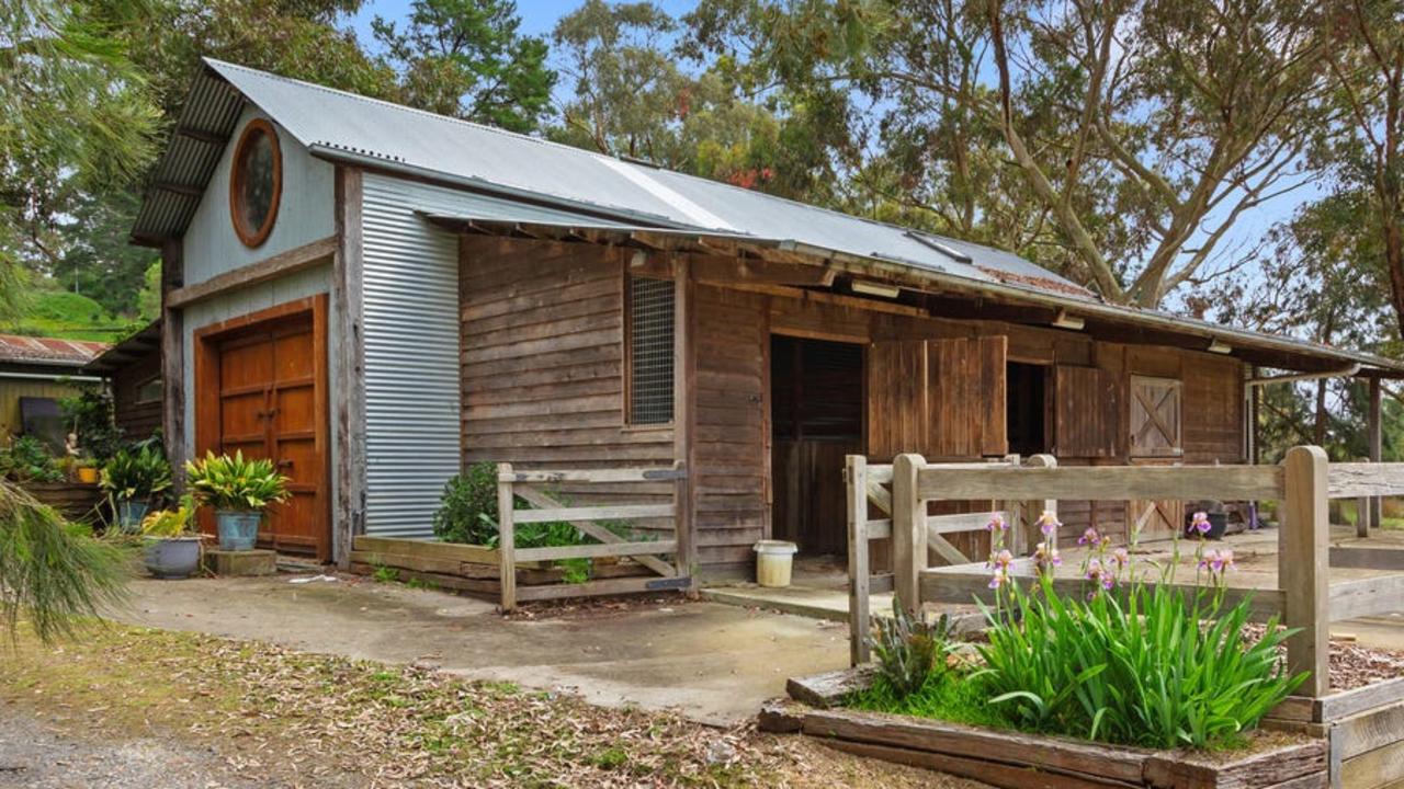 The combined residence and stables has a rustic charm.