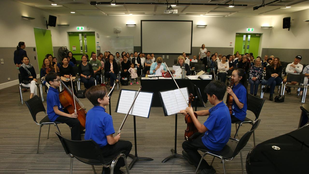 The Merrimac State Primary School Quartet warm up. Picture: Glenn Hampson.