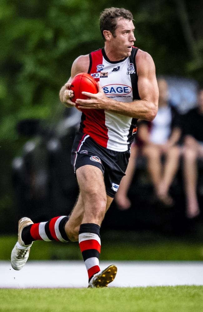 Matt Dennis with ball in hand for Southern Districts in the 2023-24 NTFL season. Picture: Patch Clapp / AFLNT Media