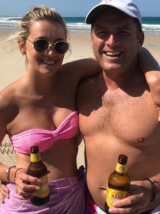 Karl and Jasmine having a couple of cold ones at the beach. Picture: Instagram