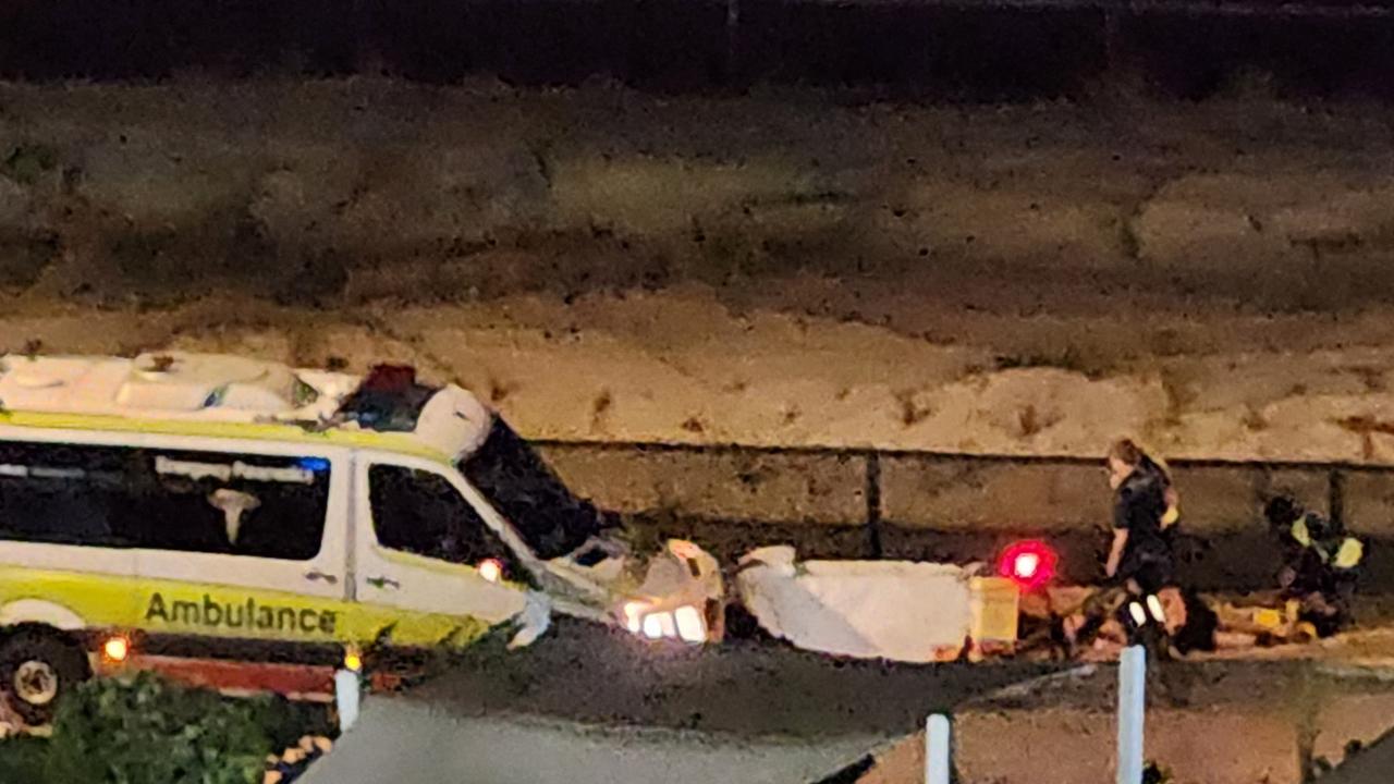 A Queensland Ambulance Service tending to an injured person allegedly hit by an e-scooter along the Oceanway Surfers Paradise, October 23, 2023.