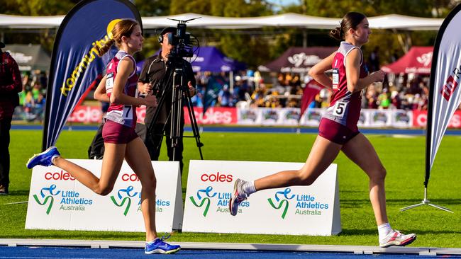 Springwood Little Athletic's Ruby Hazell, left, is well positioned.