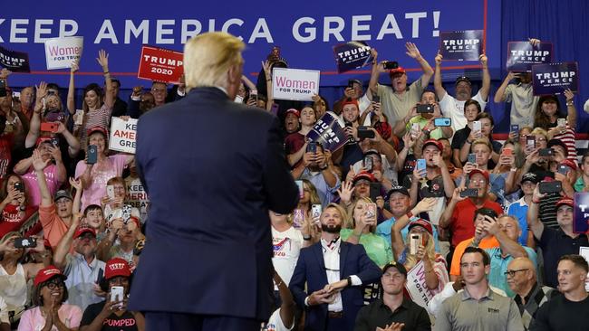 Donald Trump’s supporters use their cameras to photograph him at a rally in Fayetteville, North Carolina, last month. Picture: Reuters