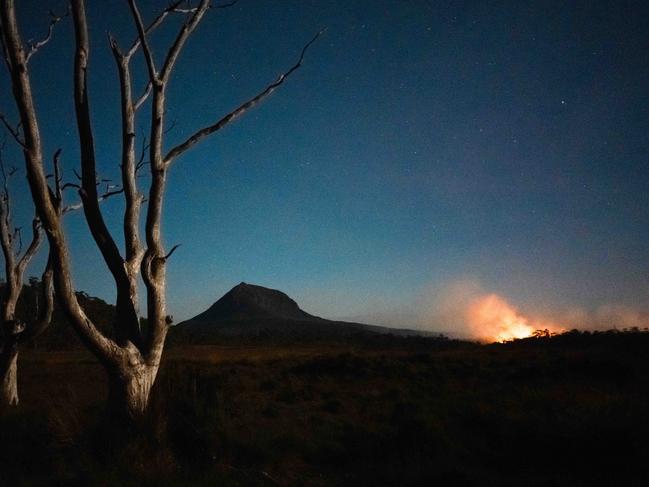 View from the summit of Mt Oakleigh showing the southern fire front on the flanks of Pelion West.  The bushfire has now impacted the Overland Track in the Cradle Mountain-Lake St Clair National Park.  Picture: Shaun Mittwollen****THE MERCURY ONLY USE - SEE NIKKI DAVIS-JONES****