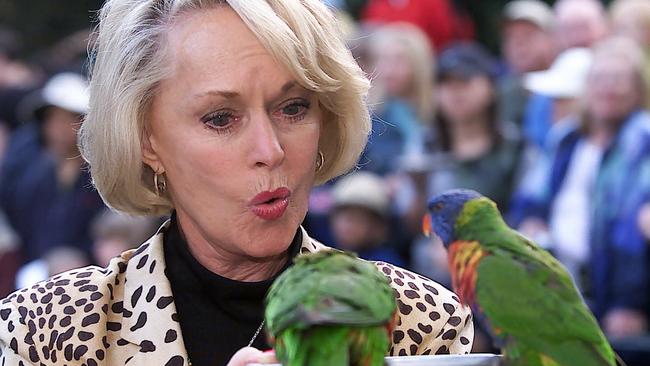 Actor Tippi Hedren feeding birds at Currumbin Wildlife Sanctuary.