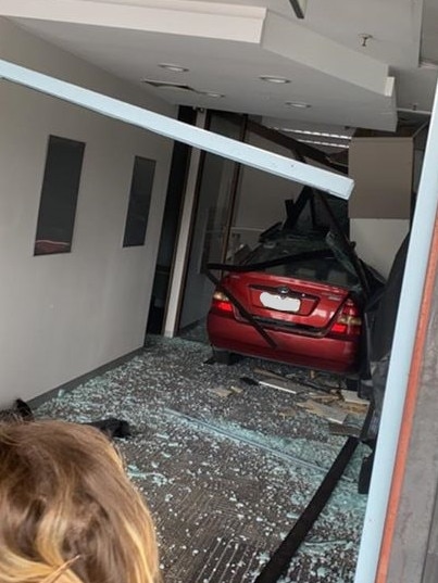 The car drove metres into the store.