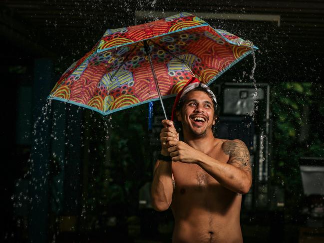 Gus Fitzgerald of Fannie Bay stoked to have a wet Xmas. Picture: Glenn Campbell