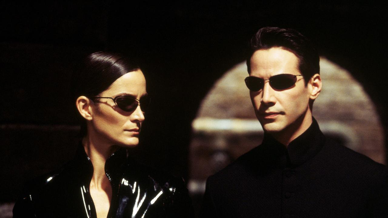 Carrie-Anne Moss with Keanu Reeves in scene from the The Matrix Reloaded. Picture: Supplied