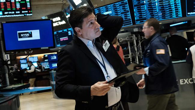 Traders work on the floor of the New York Stock Exchange. Picture: Spencer Platt/Getty Images/AFP