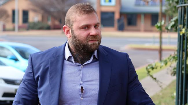 Finks bikie Nathan Lazarus arrives at Goulburn Local Court on Thursday. Picture: Blake Foden