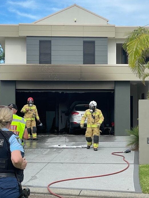 She protected her home with a garden hose until the fire brigade arrived.