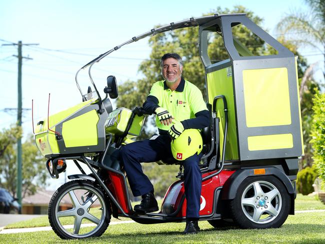 Postman Juan Alvarez with the new three wheeled Post Bike. Picture: Tim Hunter.