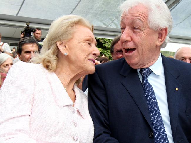 Frank Lowy with his wife Shirley as the crowd applauds him during the official launch of the Lowy Cancer Research Centre at University of NSW, Kensington in Sydney. Picture: Cameron Richardson