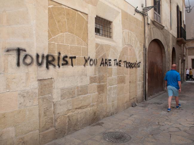 Graffiti reading “Tourist you are the terrorist” in Palma, Majorca, on May 23, 2016. Picture: Enrique Calvo/Reuters