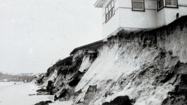 Coastal damage during the 1954 cyclone. This is erosion at the Palm Beach surf lifesaving club on the Gold Coast.