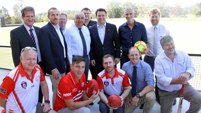 SPORTING HUB: Celebrating the $6M grant for Oakes and Crozier Ovals were sporting players, coaches, officials and politicians. L-R Scott Turner., Cr Isaac Smith, Steve Mackney, Thomas George MP, Glen Lees, Minister Ayres, Craig Foster and Mitch Lowe. Front - Simon Stainton, Philip Tsourlinis, Phillip Knowles, Austin Curtain and Matt Wilson. Picture: Alison Paterson